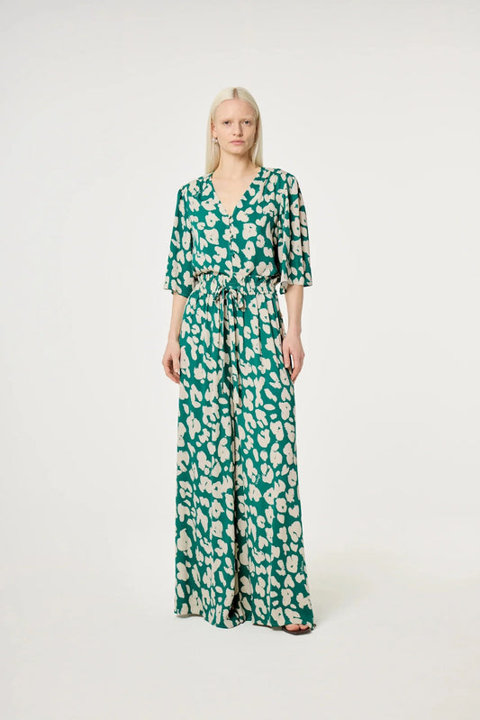 Grön blommig byxdress med v-ringning och vida ben dam