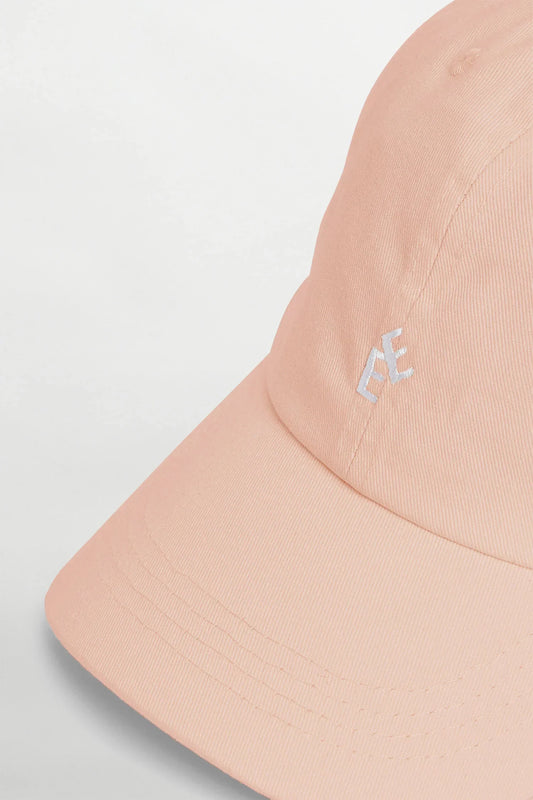Peachfärgad keps med broderad logotyp herr