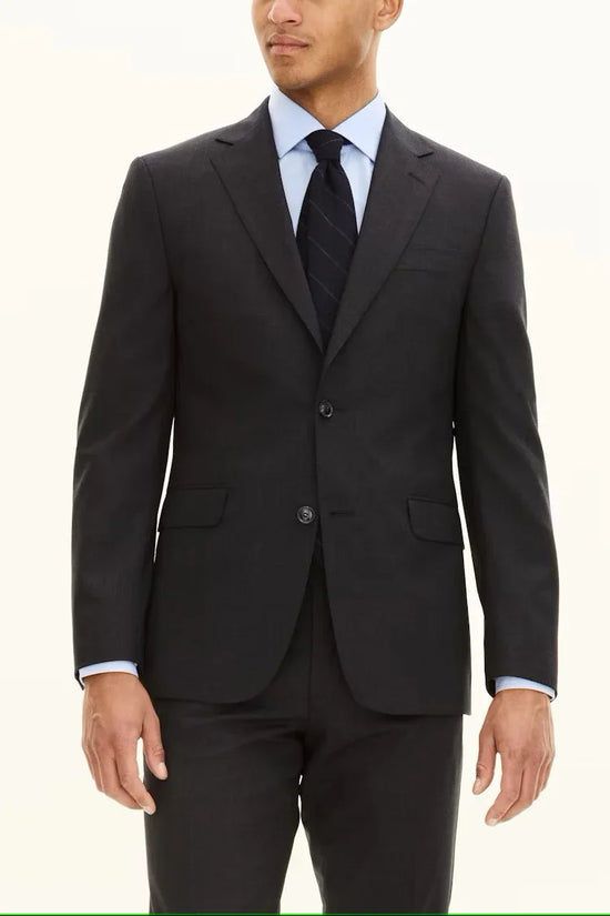Herr i mörkgrå blazer, blå skjorta och slips, klassiskt herrmode, kostymkläder