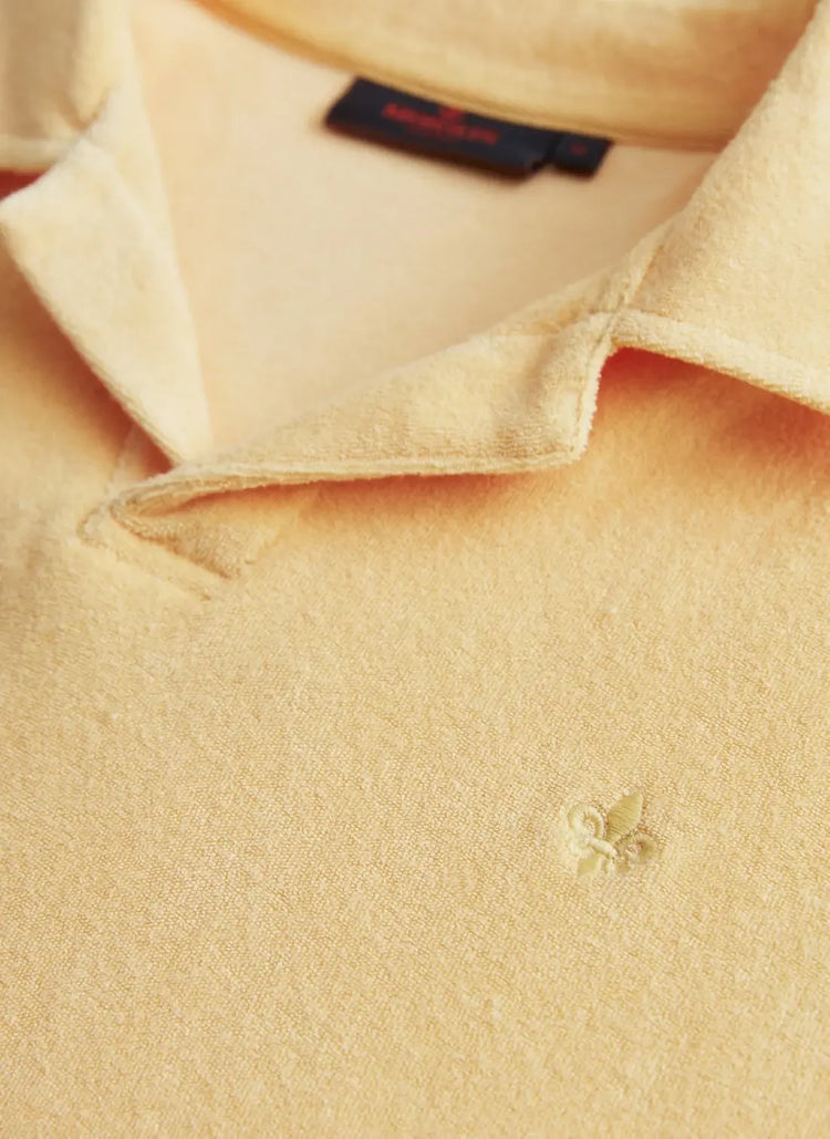 Delon Terry orange pikétröja herr med broderad detalj