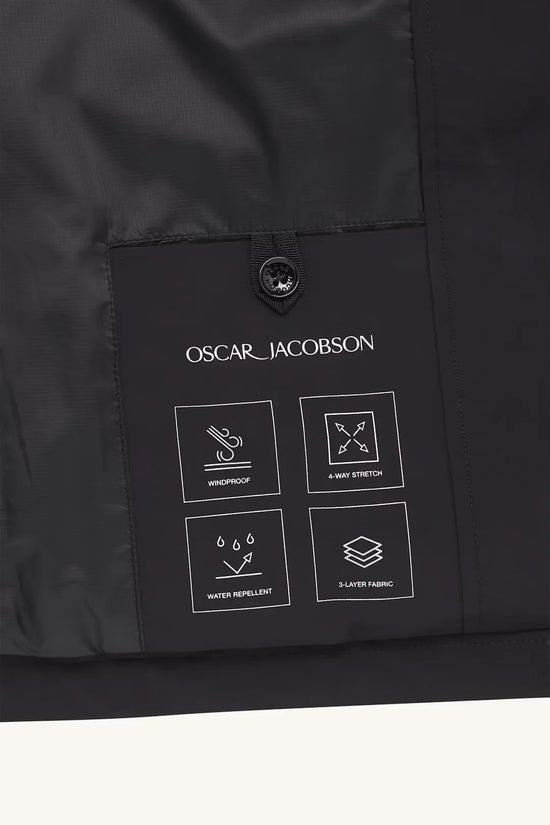 Oscar Jacobson herr jacka med vind- och vattenavvisande egenskaper, närbild av innerficka