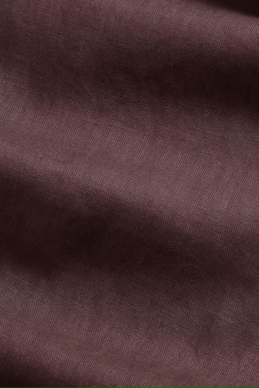 Brun tygstruktur i närbild, klassisk herrkläder textil, vävd yta