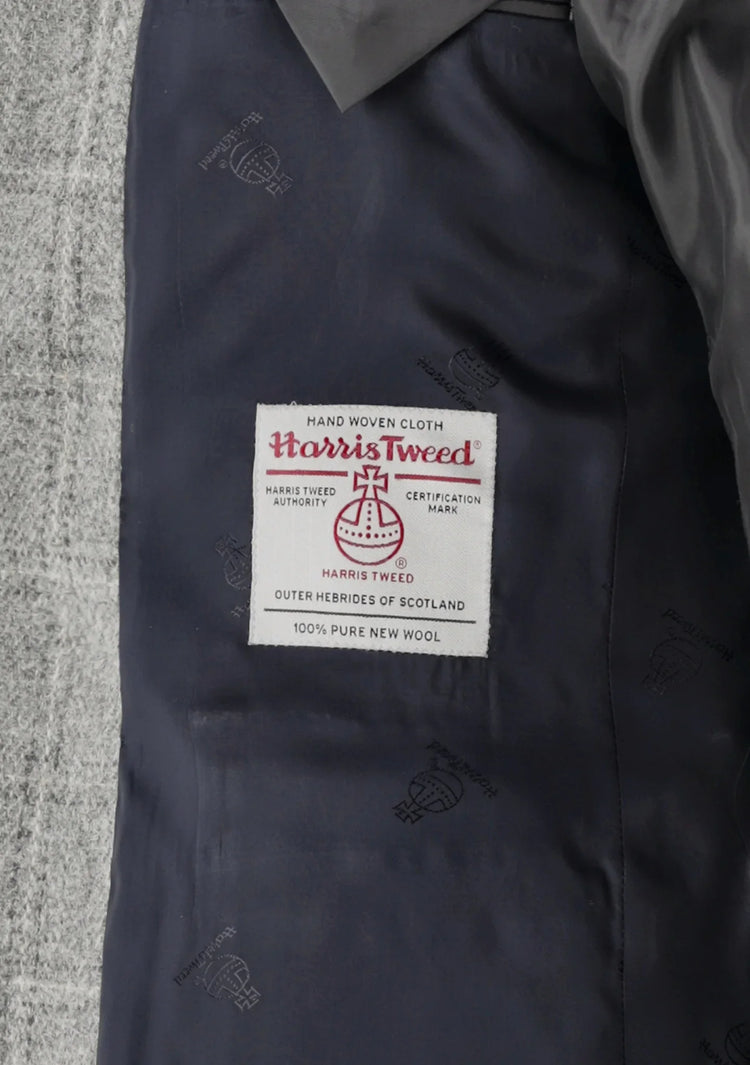 Närbild på Harris Tweed-certifiering i grå herrkavaj, 100% ull, hög kvalitet