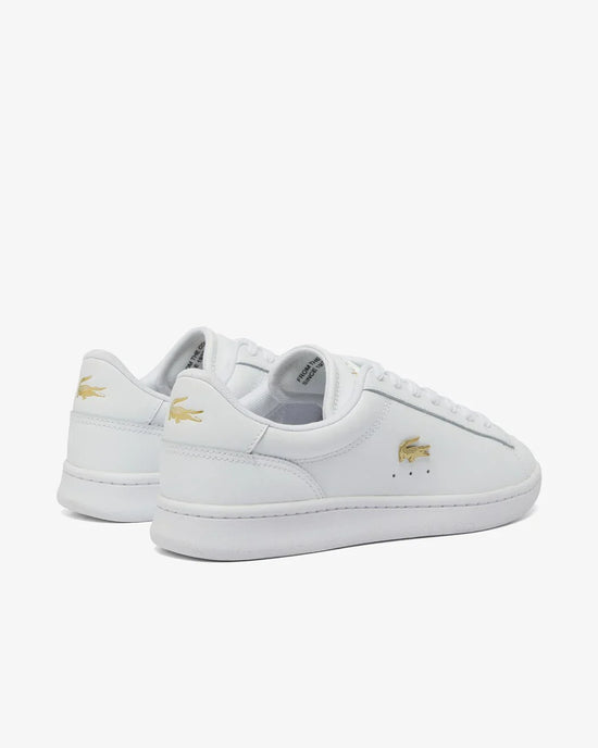 Lacoste vita sneakers herr med guldfärgad logo i läder