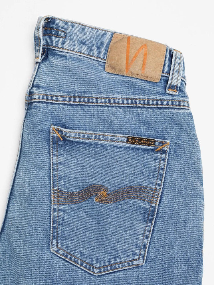 Blå vintage herrjeans med brun läderpatch och bakficka, klassiskt snitt