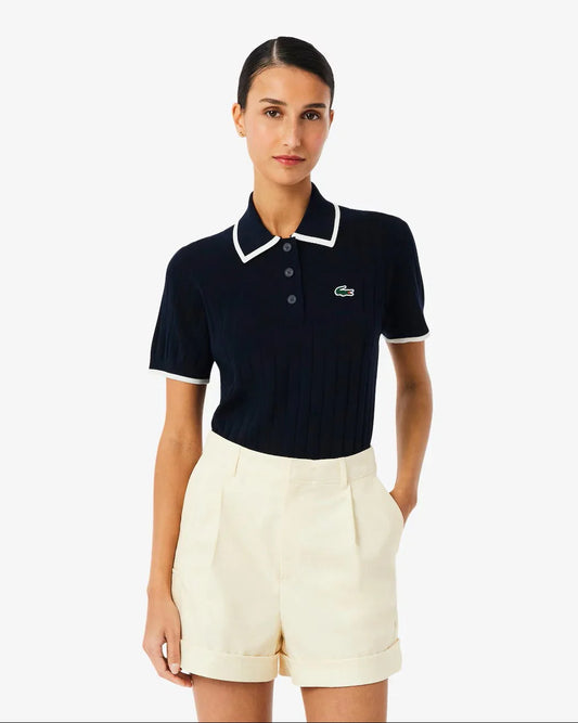 Lacoste marinblå pikétröja med vit krage dam