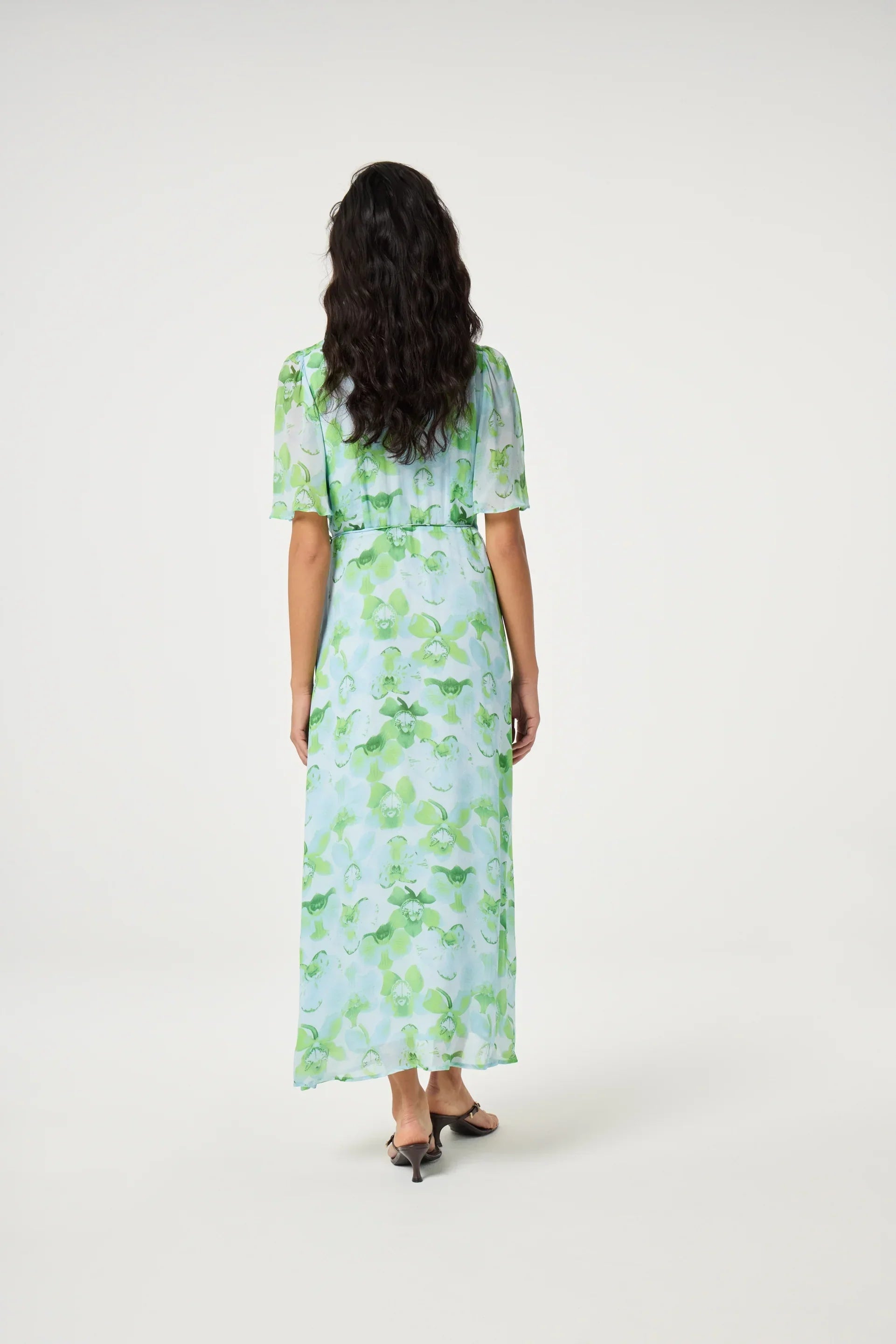 Grönblå blommig maxi klänning med kortärmad design