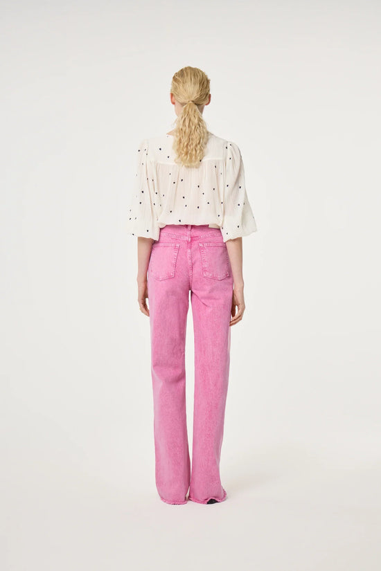Bindi Top vit blus med svarta prickar