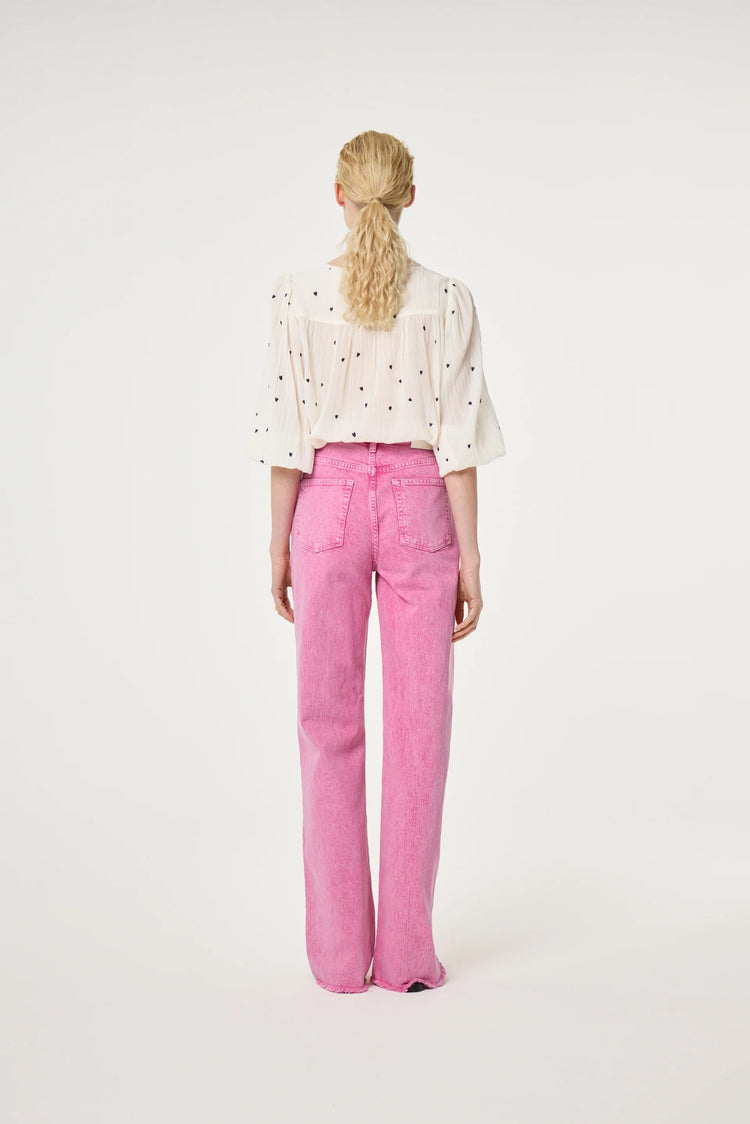 Bindi Top vit blus med svarta prickar
