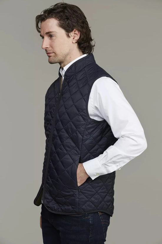 Coredo quiltad väst navy herr ytterplagg