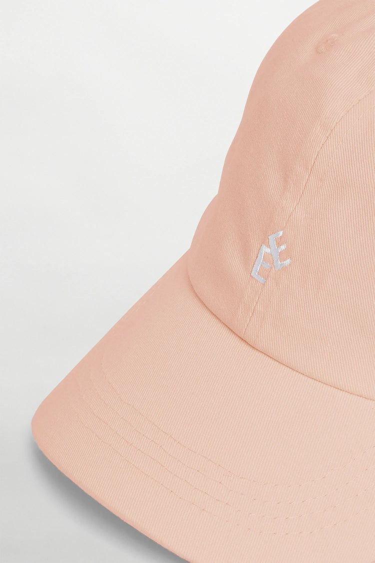 Peachfärgad keps med broderad logotyp herr