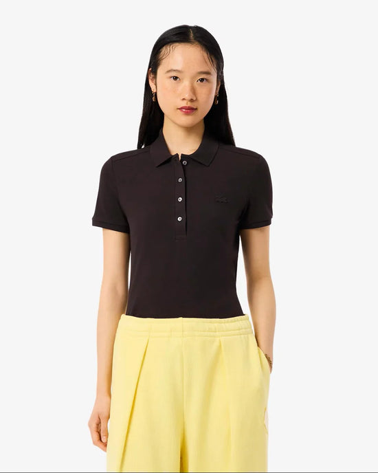 Lacoste svart pikétröja dam, kort ärm, knappslå, broderad logotyp